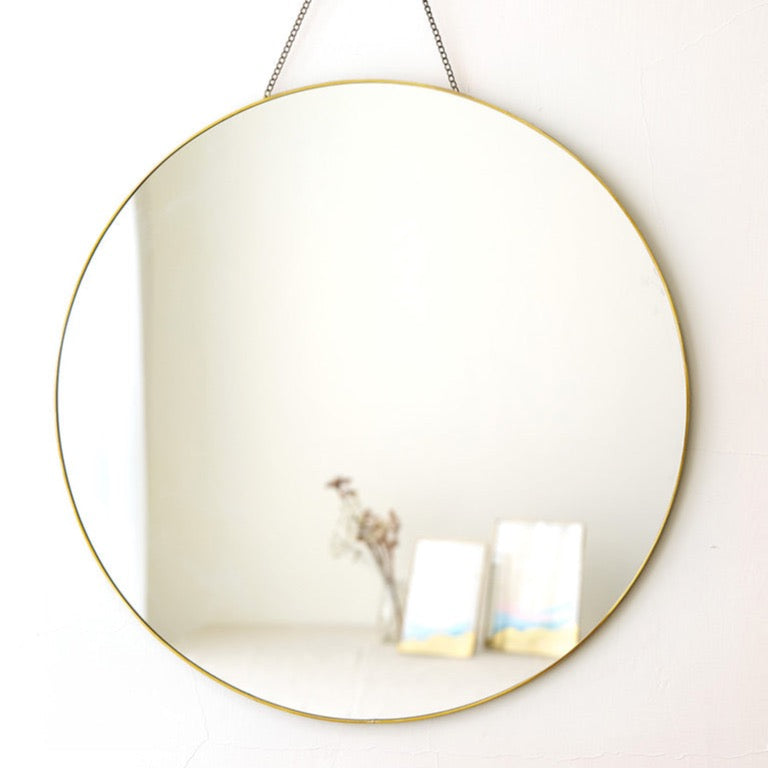 Brass round mirror on the wall- modern home decor- Wave Design-The most beautiful homeware and the best home decoration items at FONDAZZA.